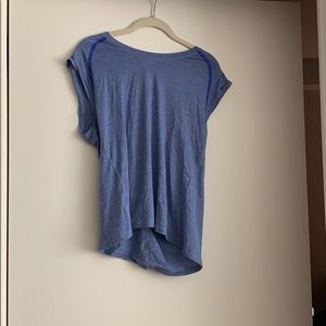 Blue Lululemon top with open, twisted back